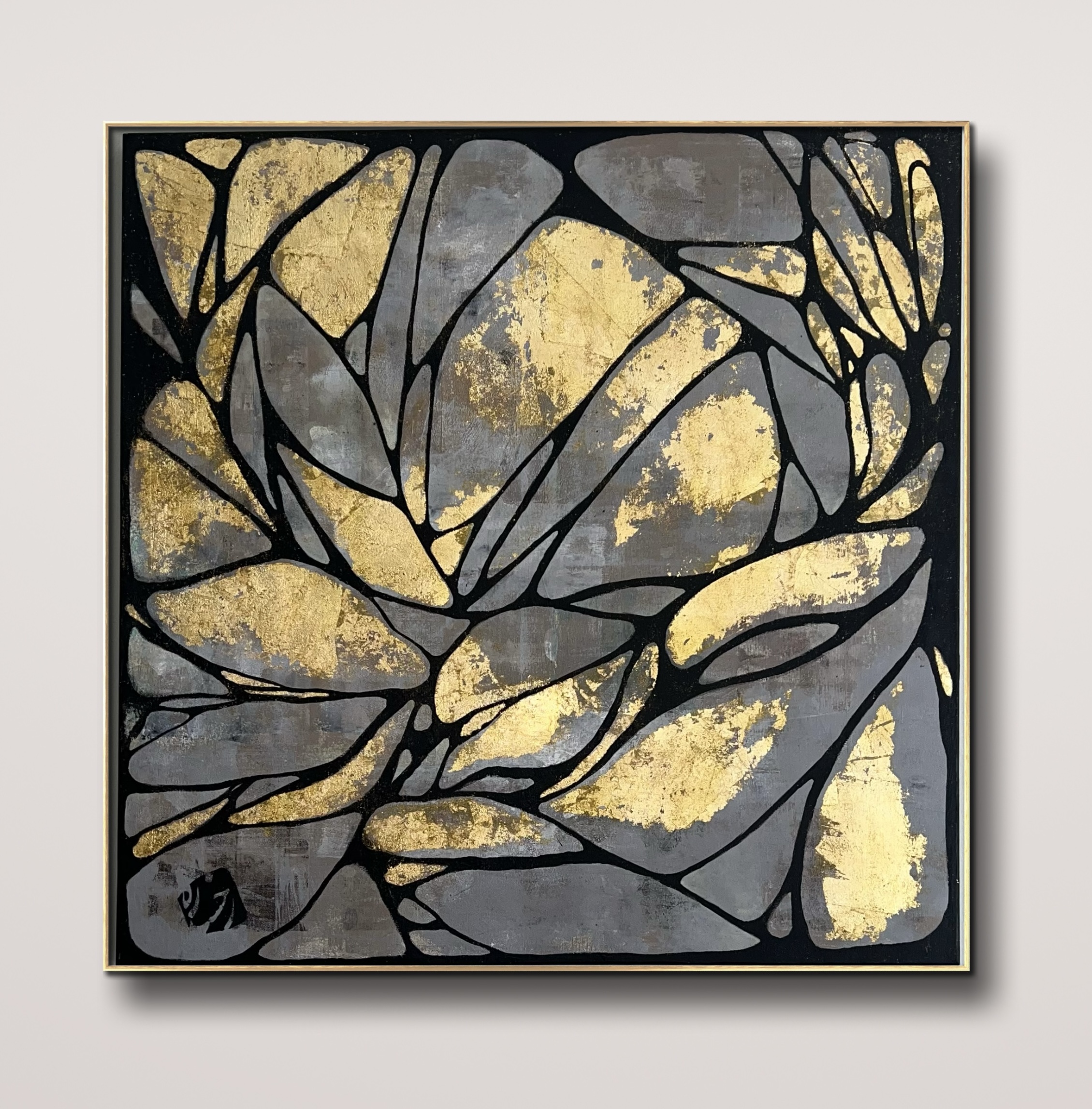 Framed abstract painting with gold and grey shapes separated by black lines